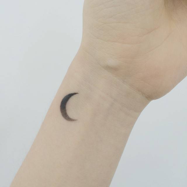 Tiny crescent moon tattoo - Tattoogrid.net