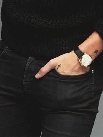 Tiny cross tattoo