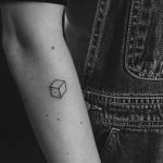Tiny dice tattoo
