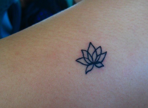 Tiny lotus flower tattoo