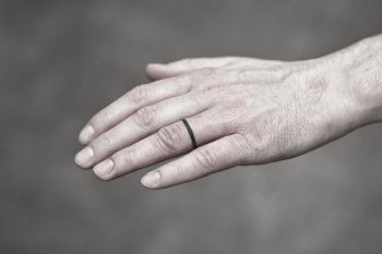 Tiny ring tattoo
