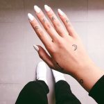 Tiny tattoos on the hand