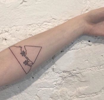 Triangle tattoo on the arm