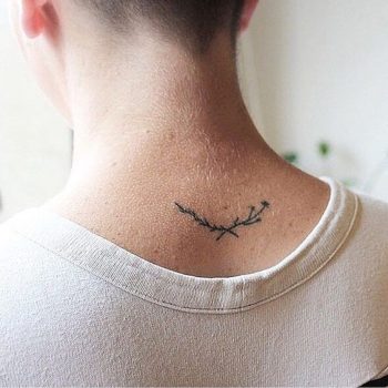 Twig tattoo on the back