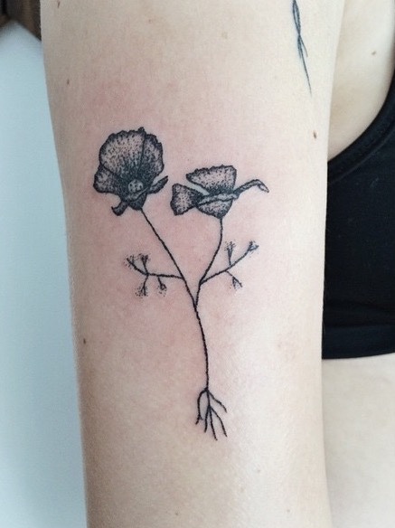 Wildflower with roots tattoo