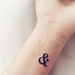 symbol tattoo on the wrist