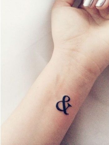 symbol tattoo on the wrist
