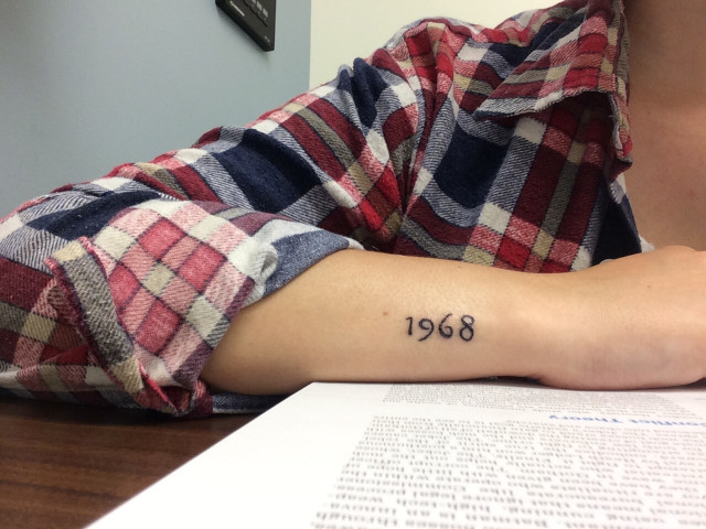 1968 date tattoo on the wrist