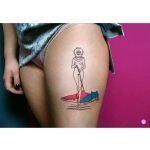 A woman with a diving helmet tattoo