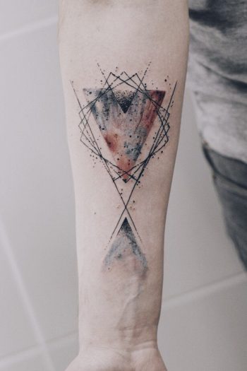 Abstract geometric tattoo on the arm