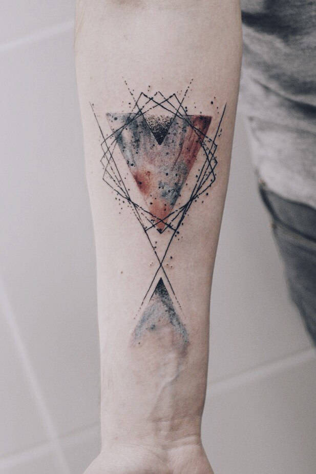 Abstract geometric tattoo on the arm