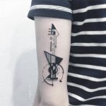 Abstract guitar tattoo