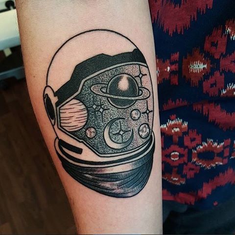 Astronaut helmet tattoo