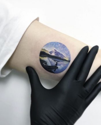 Beautiful circular landscape tattoo