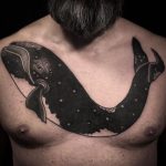 Big black whale tattoo