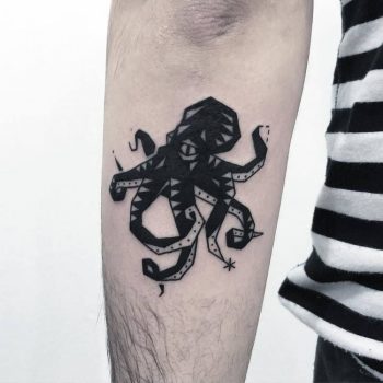 Black octopus tattoo