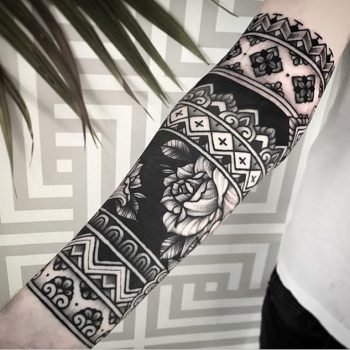 Black pattern sleeve tattoo