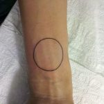 Black thin circle tattoo