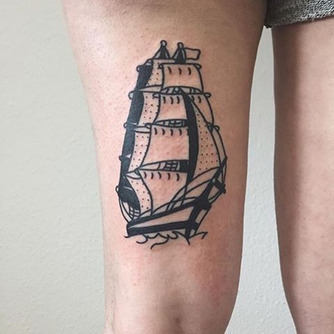 Black traditional ship tattoo