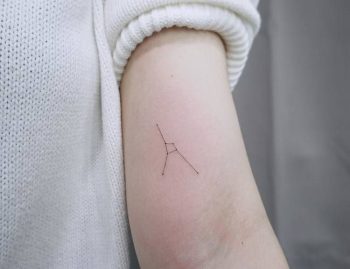 Cancer constellation tattoo on the arm
