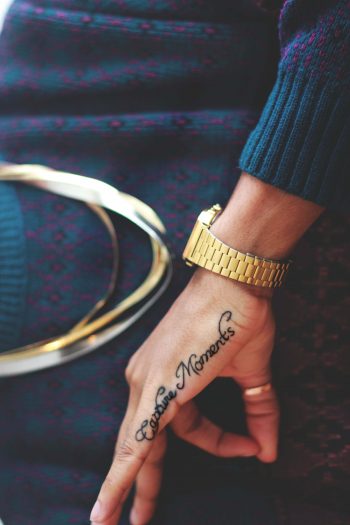 Capture moments phrase tattoo