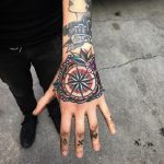 Classic compass tattoo on the hand