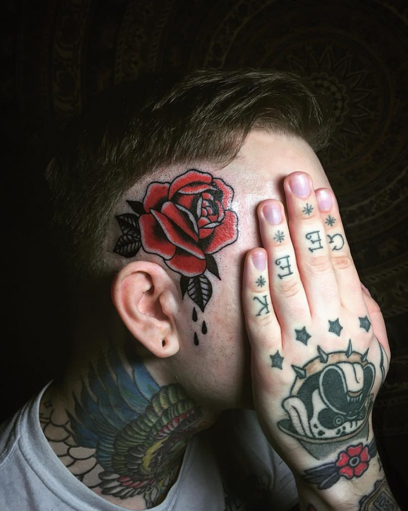 Classic rose tattoo on the head