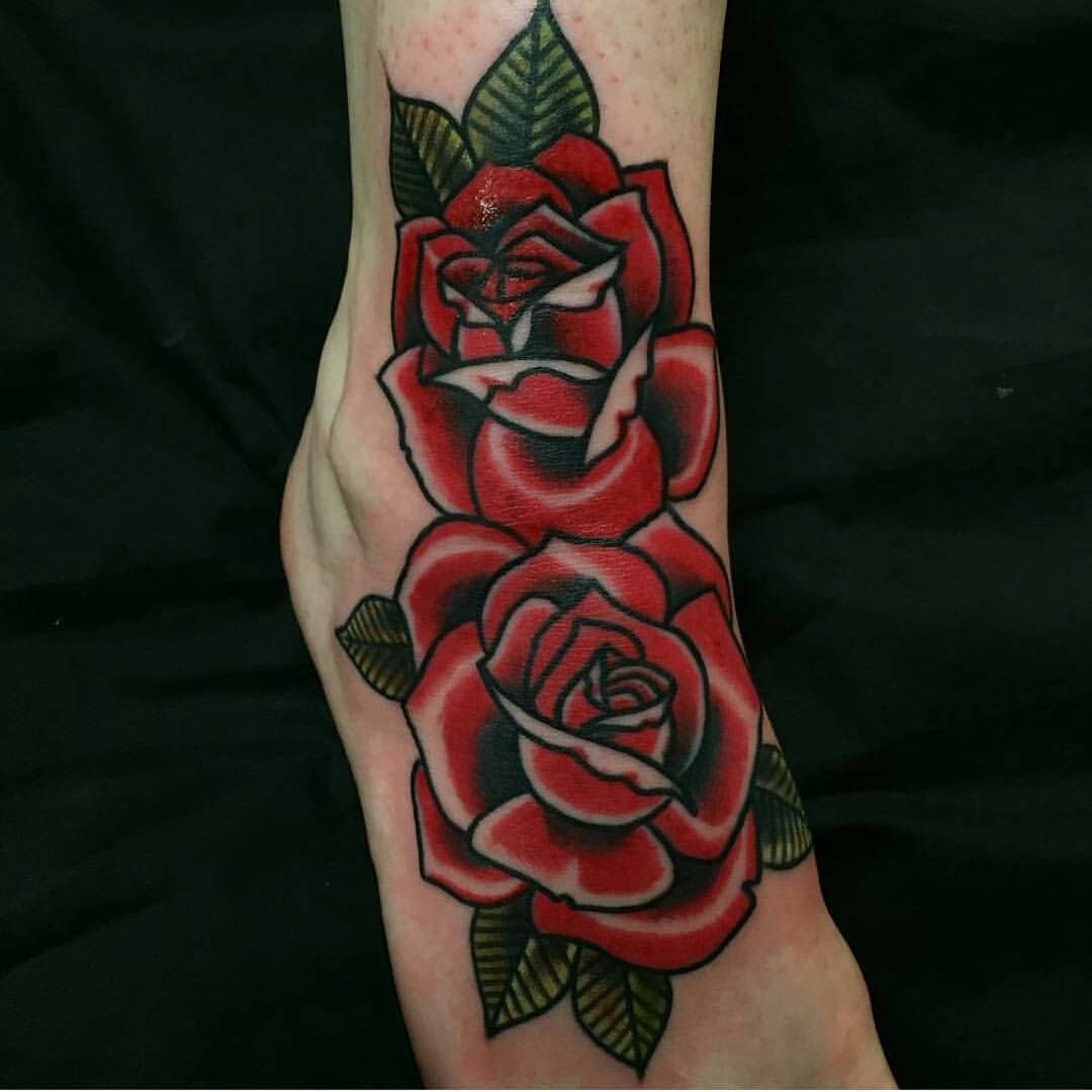 Classic style rose tattoo