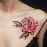 Classy red rose tattoo on the chest