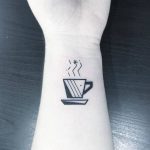 Coffee cup tattoo on the wrist