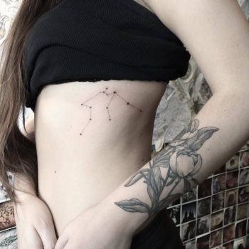 Constellation tattoo on the left rib