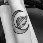 Crescent moon and alien spaceship tattoo