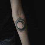 Crescent moon and sun tattoo