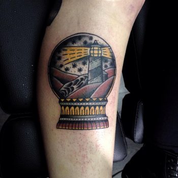 Crystal ball tattoo