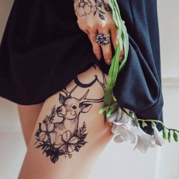 Deer and flowers tattoo