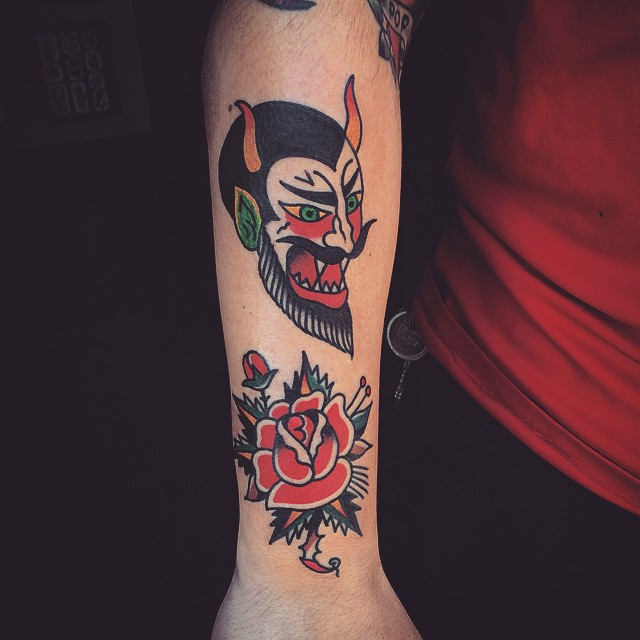 Devil and red rose tattoo