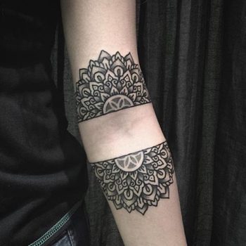 Divided mandala tattoo