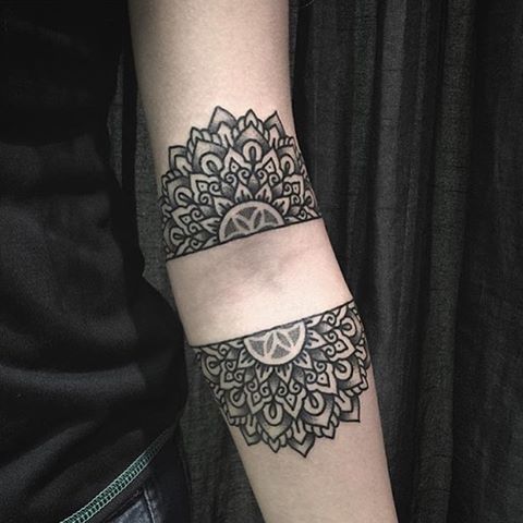 Divided mandala tattoo