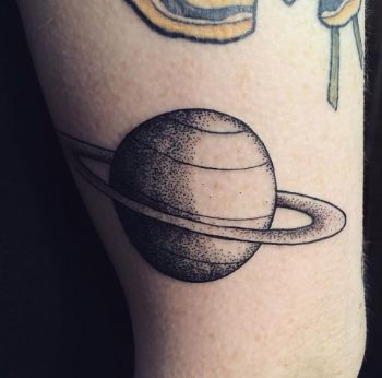 Dot work style saturn tattoo