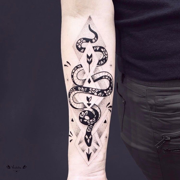 Dotwork black snake tattoo on the left arm