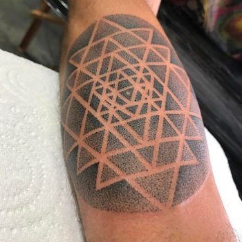 Dotwork sacred geometry tattoo on the arm