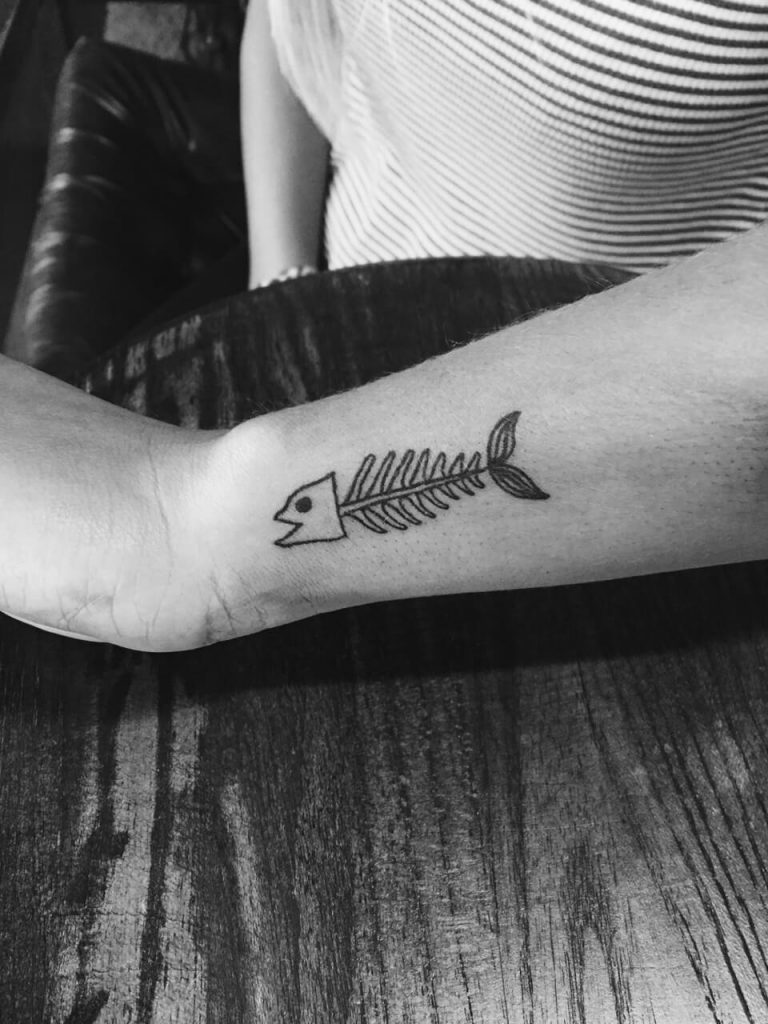 Fish skeleton tattoo