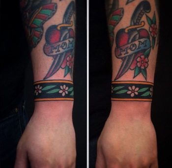 Floral wristband tattoo