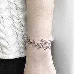 Floral wristband tattoo idea