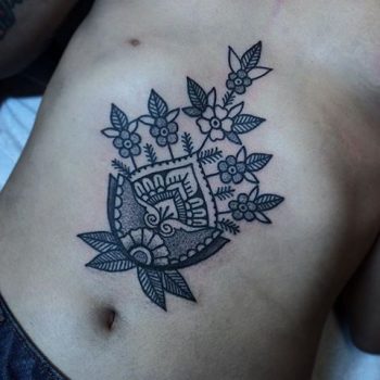 Flower in a pot tattoo