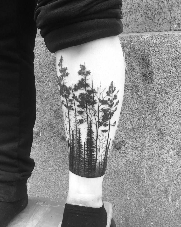 Forest scenery tattoo on the shin