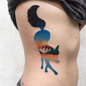 Fox tattoo with a lake and sky landscape