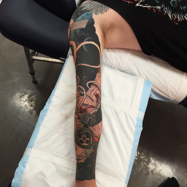 Full sleeve astronaut tattoo