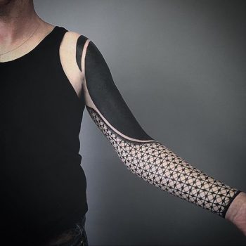 Full sleeve black geometric tattoo