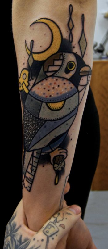 Geometric modern bird tattoo